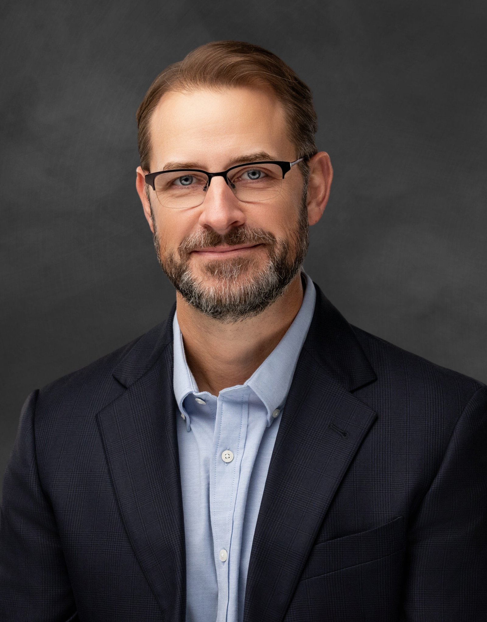 A headshot photograph of Jonathan Walter, author of THE TOWPATH and UX design leader and professional.